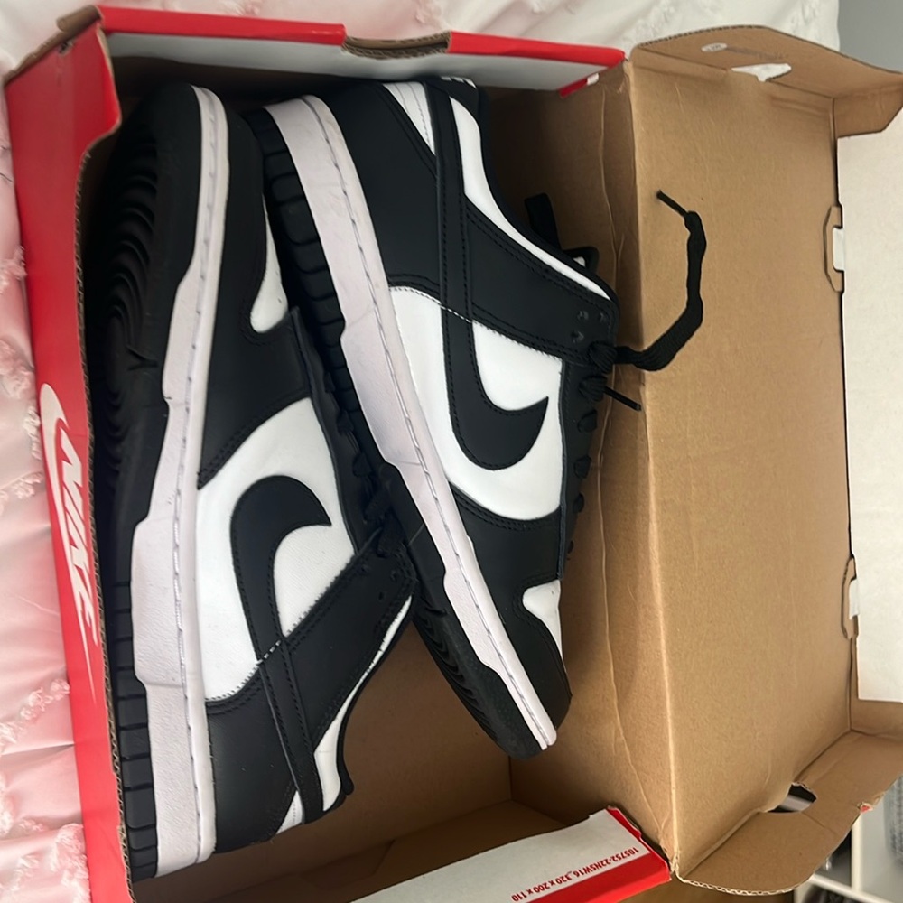 one worn black and white nike pandas